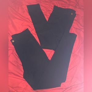 Black petite solid pocket skinny jeans